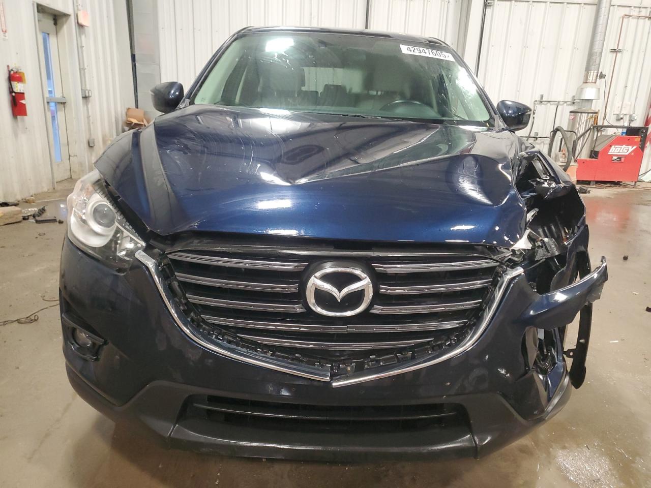 2016 Mazda CX-5 VIN JM3KE4DY3G0717611 Copart auction photo, front end / rear end damage thumbnail 5