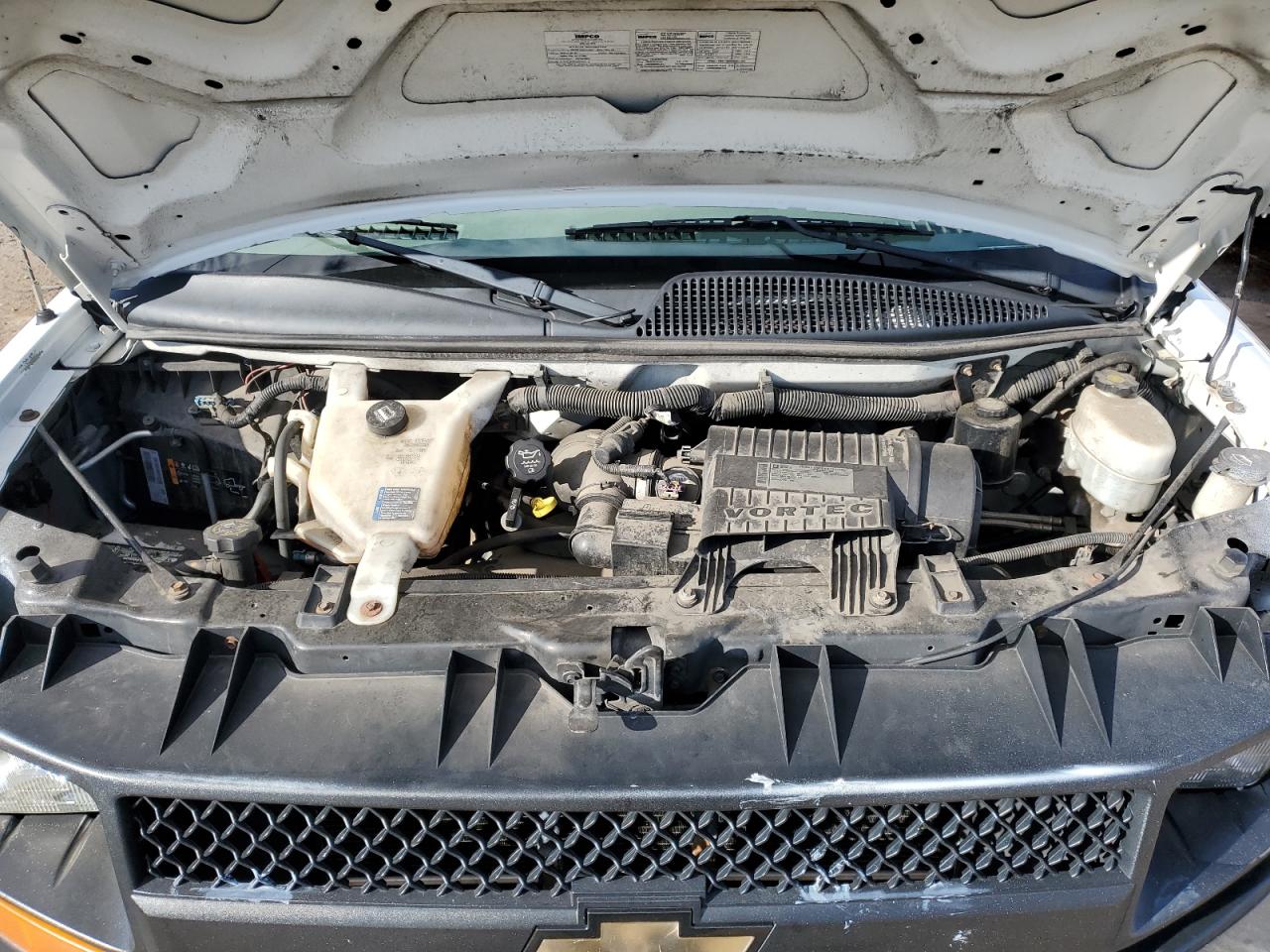 2012 Chevrolet Express VIN 1GCWGFCB3C1123067 Copart auction photo, front end damage thumbnail 12