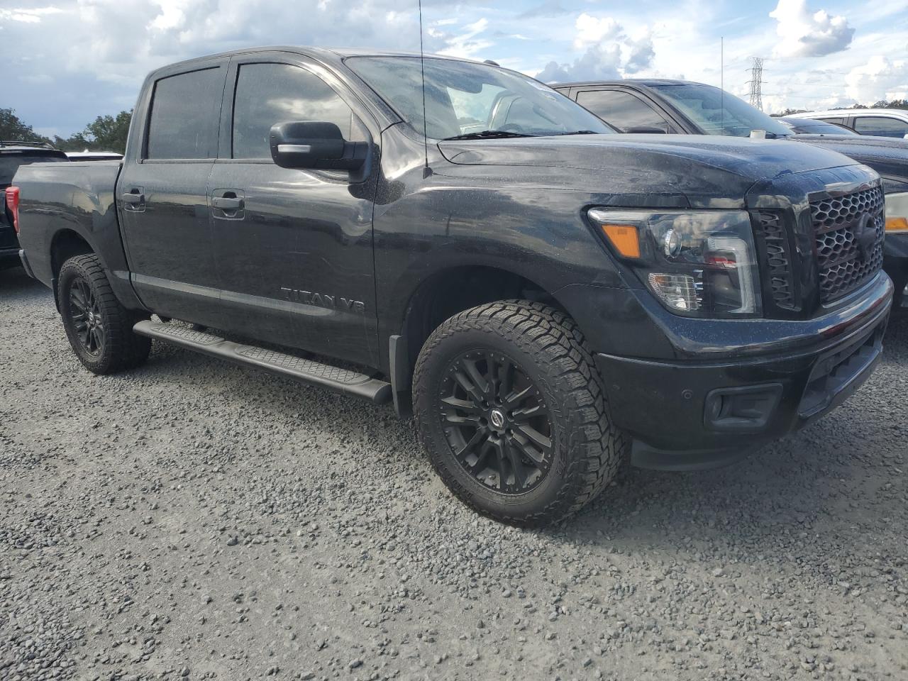2018 Nissan Titan VIN 1N6AA1E69JN520509 Copart auction photo, water/flood damage thumbnail 4