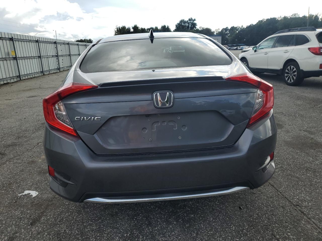 2021 Honda Civic VIN 19XFC1F35ME009816 Copart auction photo, side / front end damage thumbnail 6