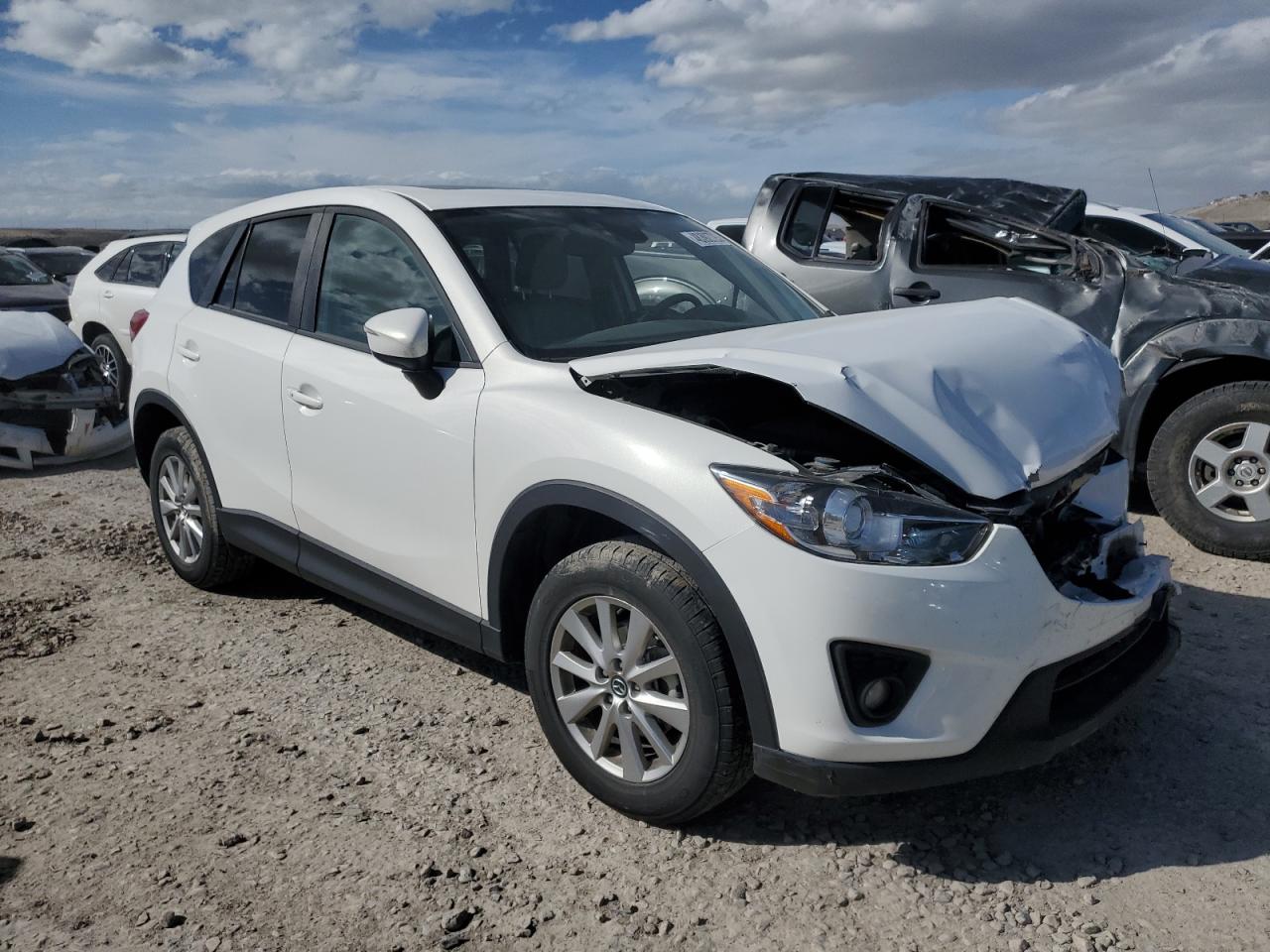 2015 Mazda CX-5 VIN JM3KE4CY7F0553862 Copart auction photo, front end damage thumbnail 4