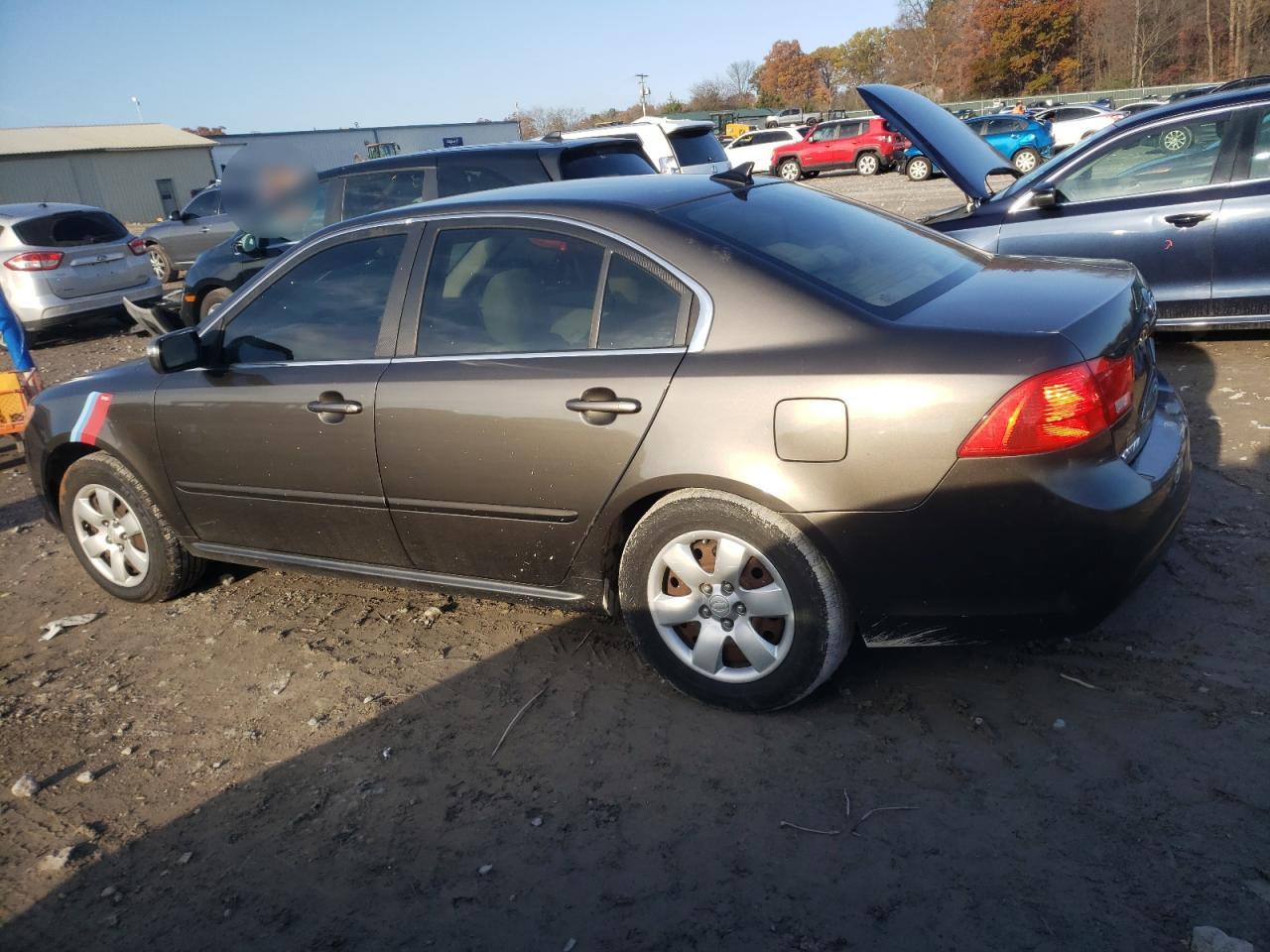 2010 KIA Optima VIN KNAGG4A84A5425597 Copart auction photo, all over damage thumbnail 2