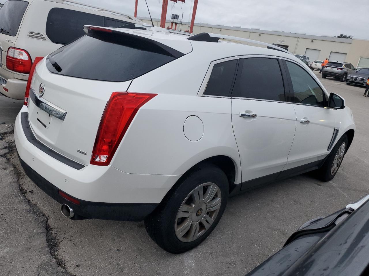 2015 Cadillac SRX VIN 3GYFNBE34FS550422 Copart auction photo, water/flood damage thumbnail 3