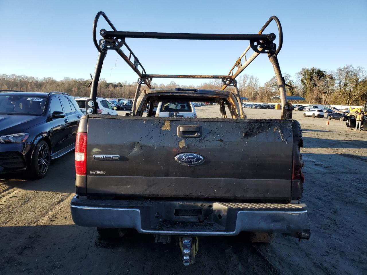 2005 Ford F-150 VIN 1FTPX145X5NA35466 Copart auction photo, burn damage thumbnail 6