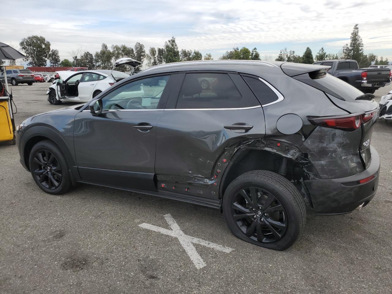 2024 Mazda CX-30 VIN 3MVDMBBM2RM693132 Copart auction photo, side / rear end damage thumbnail 2