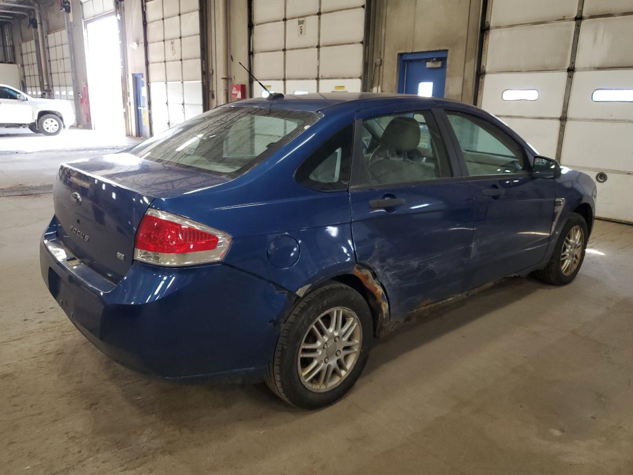 2008 Ford Focus VIN 1FAHP35NX8W167615 Copart auction photo, side / rear end damage thumbnail 3