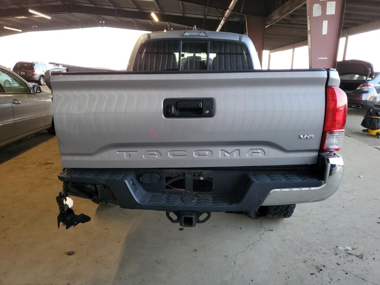 2016 Toyota Tacoma VIN 3TMDZ5BN7GM010609 Copart auction photo, rear end damage thumbnail 6