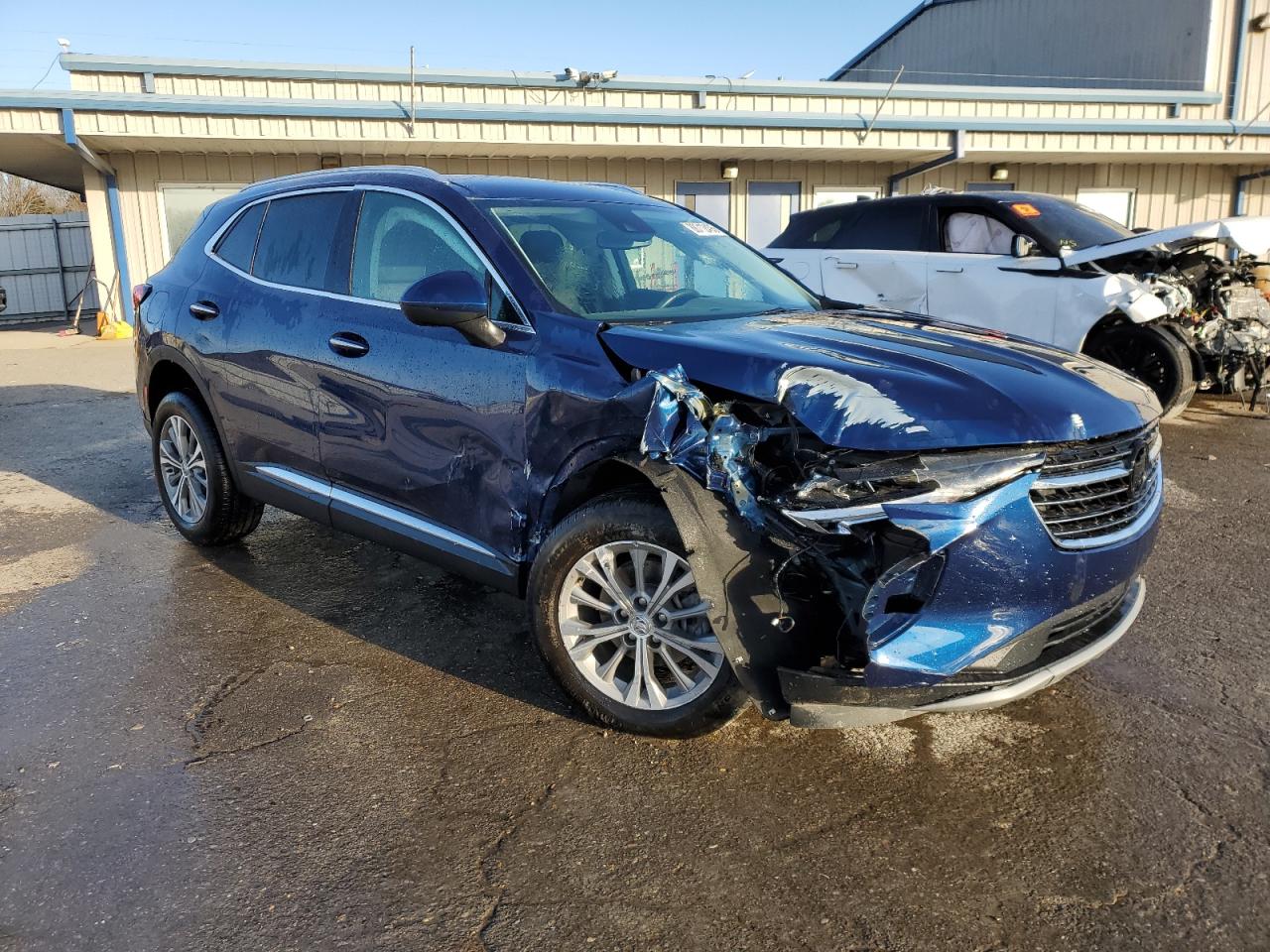 2022 Buick Envision VIN LRBAZLR46ND137623 Copart auction photo, front end / side damage thumbnail 4