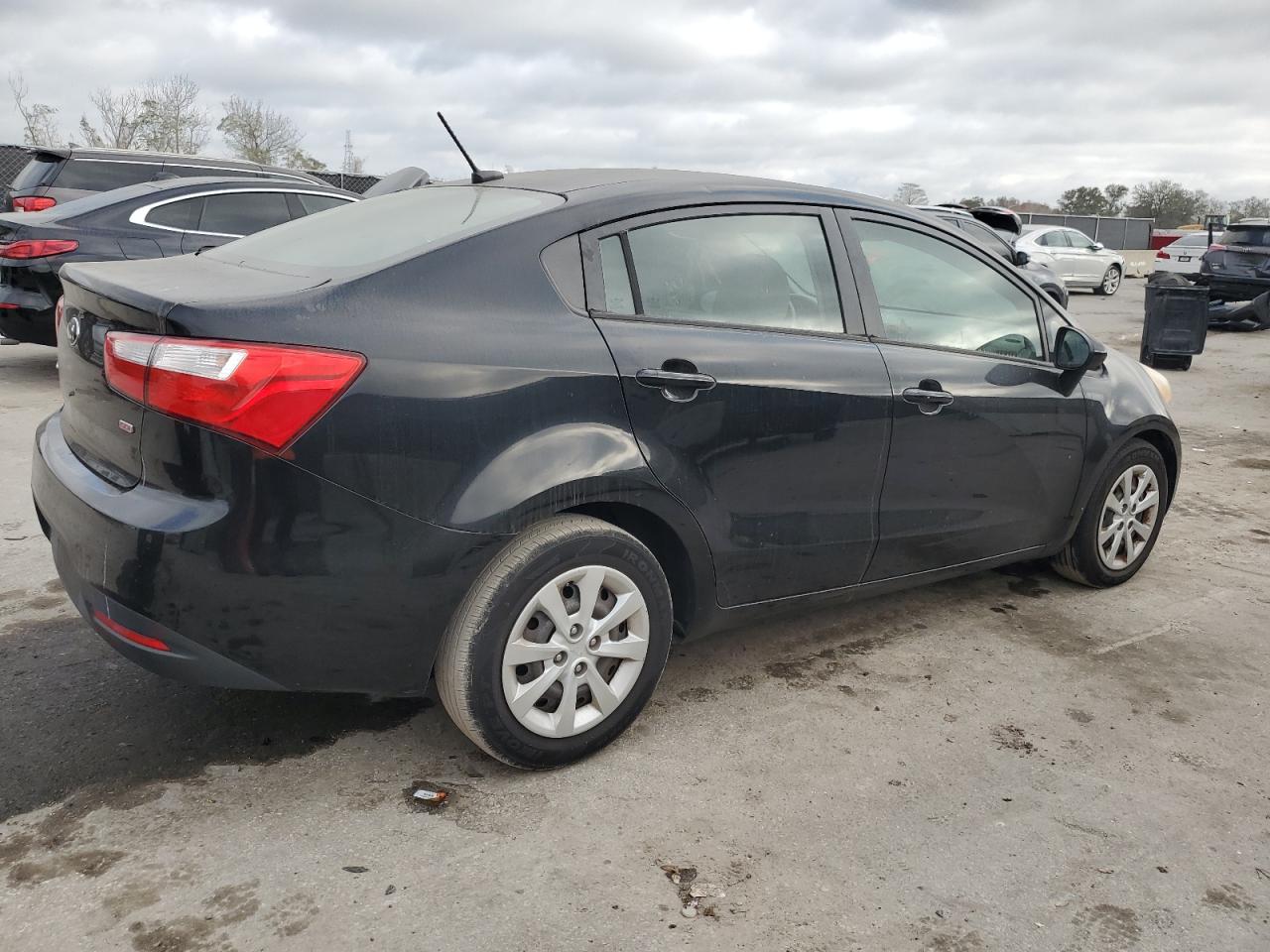 2015 KIA Rio VIN KNADM4A34F6507153 Copart auction photo, minor dent/scratches damage thumbnail 3