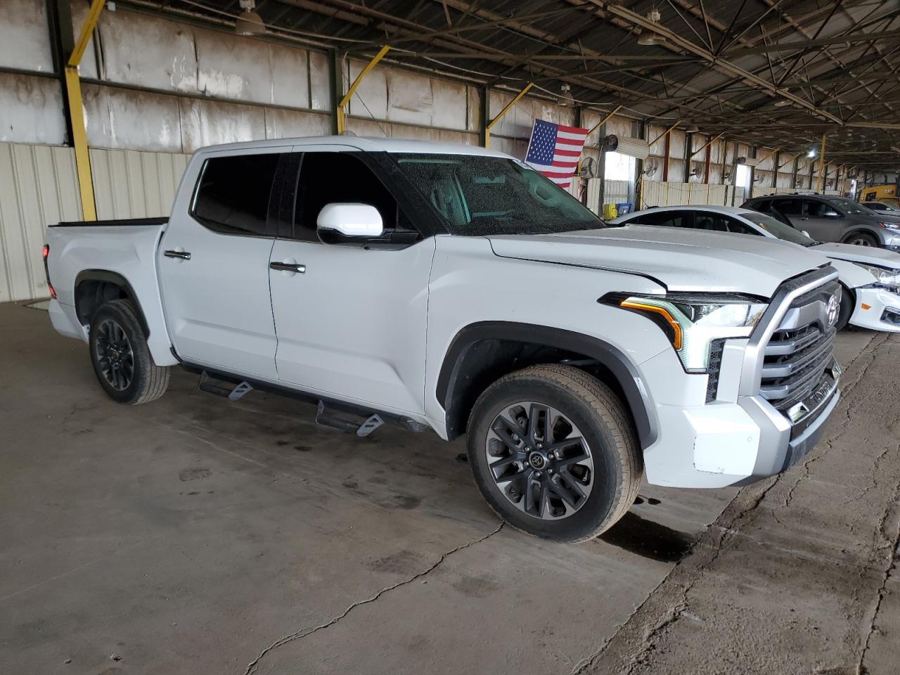 2023 Toyota Tundra VIN 5TFJA5DB2PX104372 Copart auction photo, rear end / minor dent/scratches damage thumbnail 4