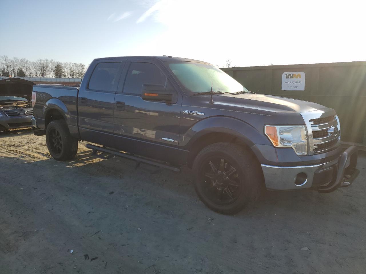 2013 Ford F-150 VIN 1FTFW1CT0DFA42398 Copart auction photo, front end / side damage thumbnail 4