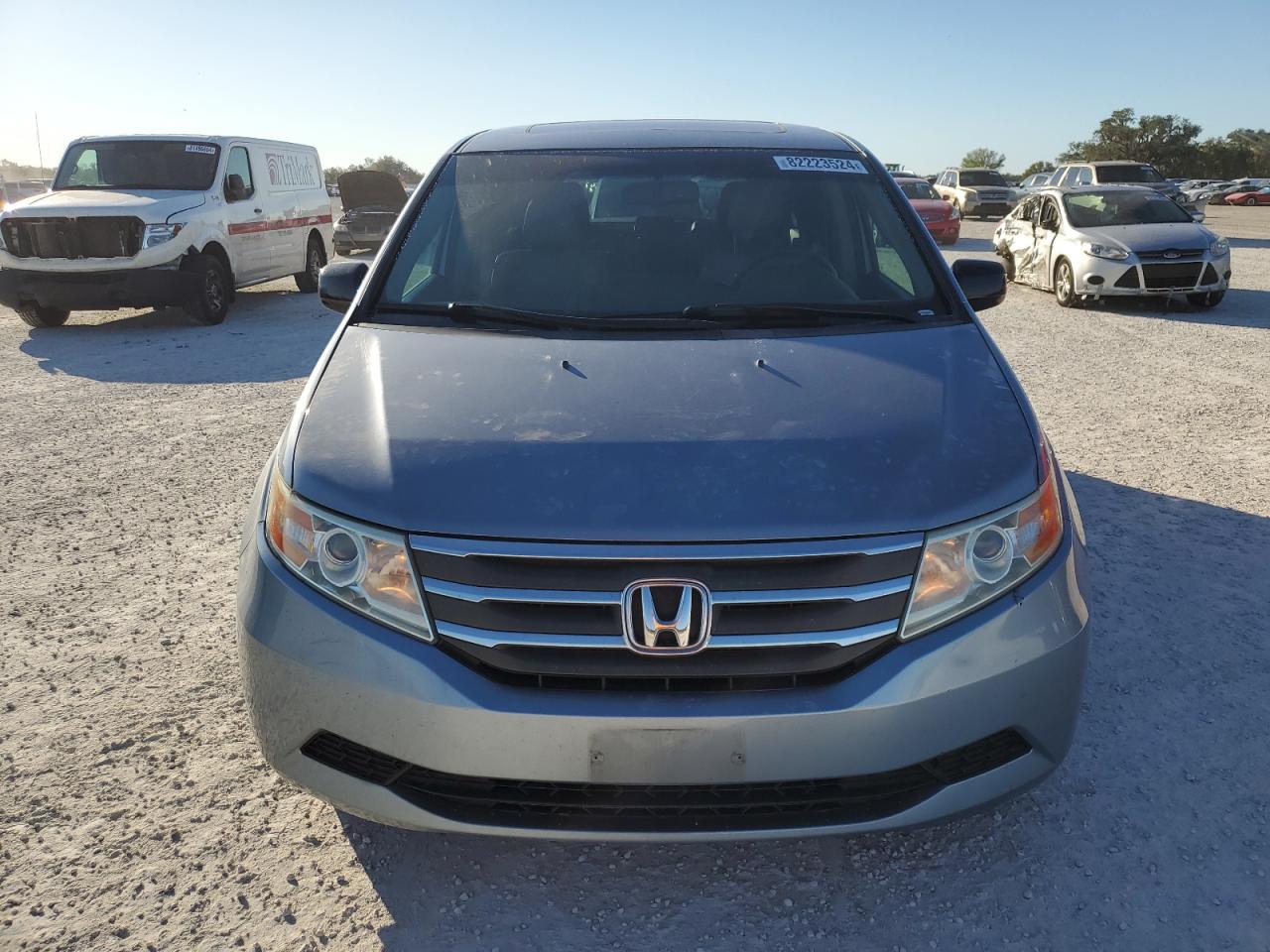 2012 Honda Odyssey VIN 5FNRL5H62CB129626 Copart auction photo, side damage thumbnail 5