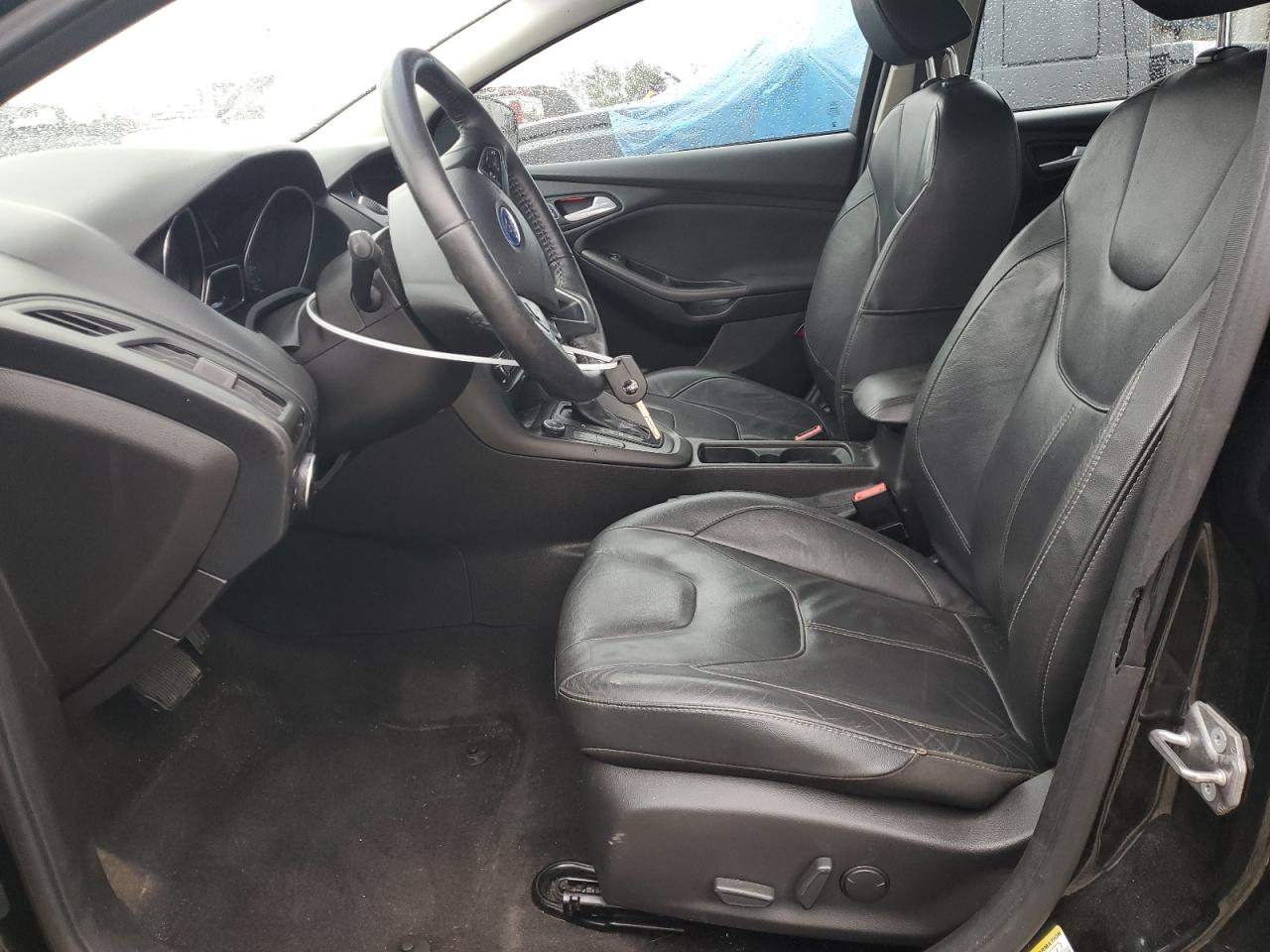 2015 Ford Focus VIN 1FADP3F28FL286944 Copart auction photo, vandalism damage thumbnail 7