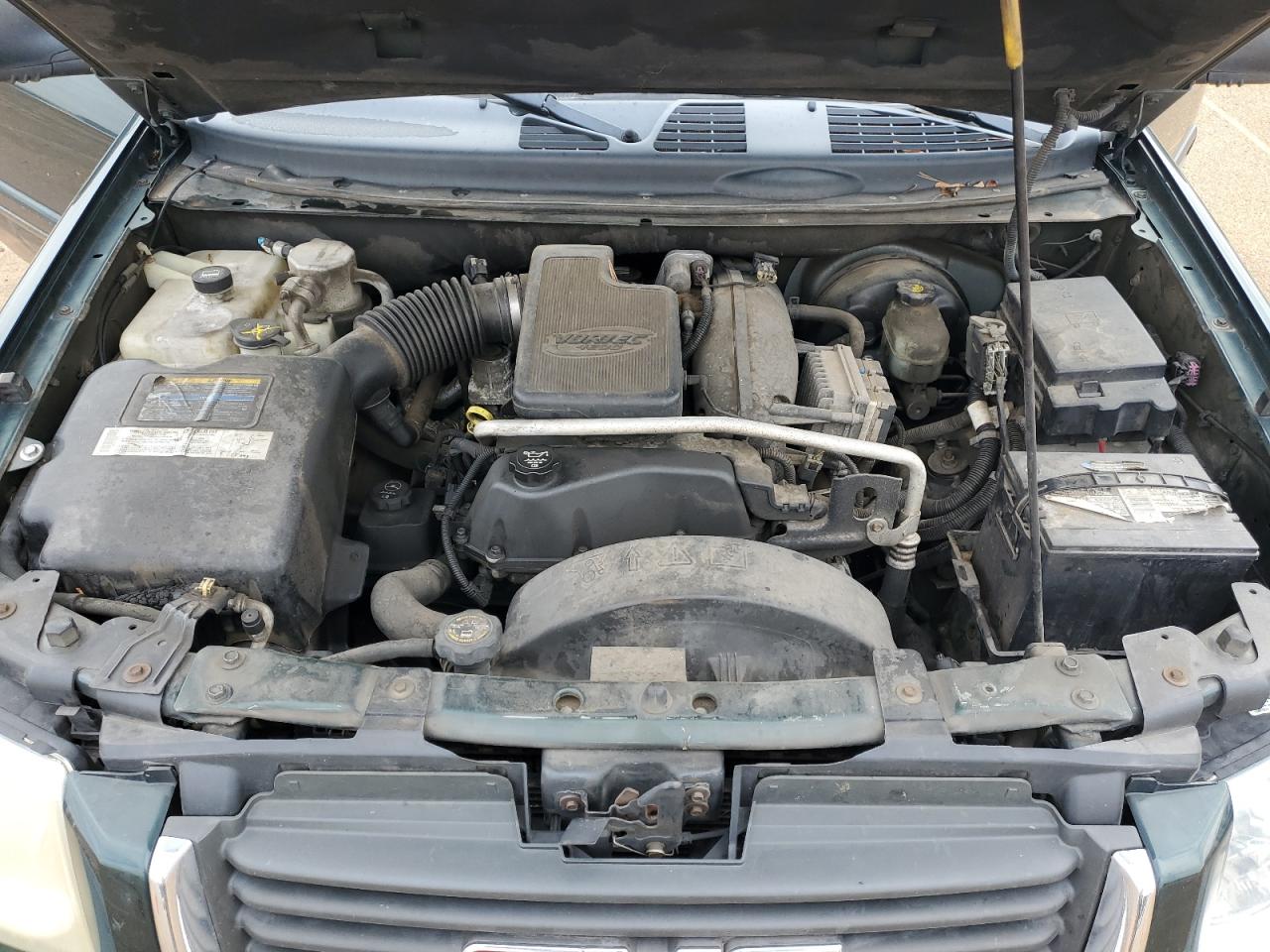 2004 GMC Envoy VIN 1GKDS13SX42234675 Copart auction photo, rear end / front end damage thumbnail 14