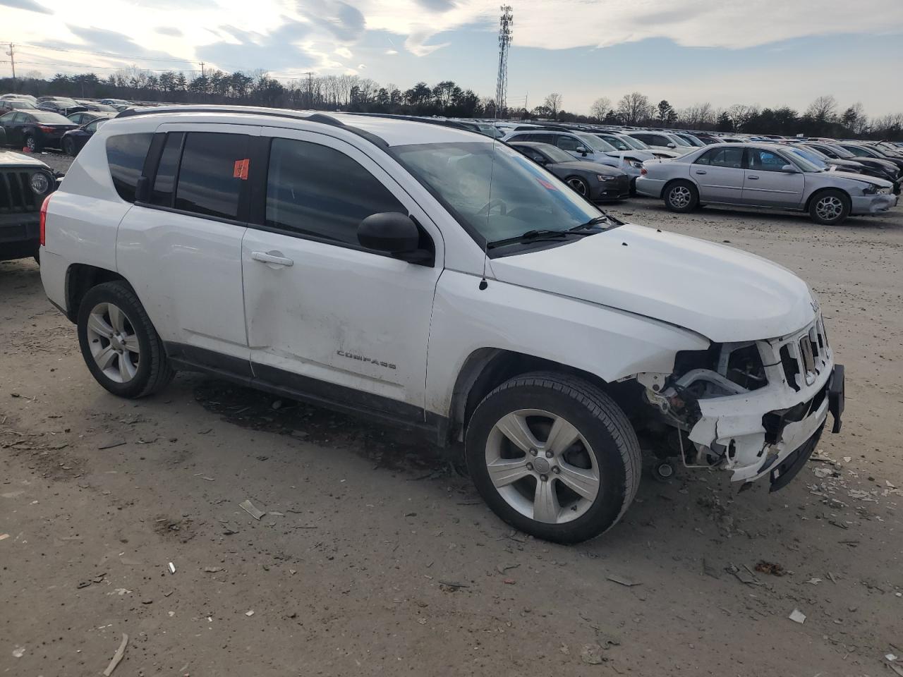 2012 Jeep Compass VIN 1C4NJDEB4CD509686 Copart auction photo, front end / side damage thumbnail 4
