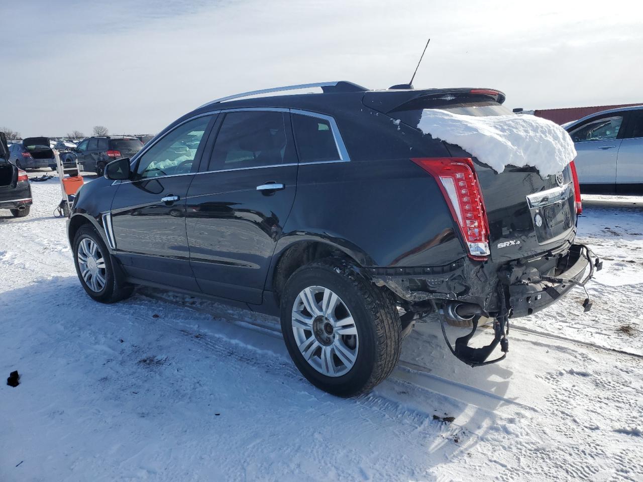 2015 Cadillac SRX VIN 3GYFNEE35FS610015 Copart auction photo, rear end damage thumbnail 2