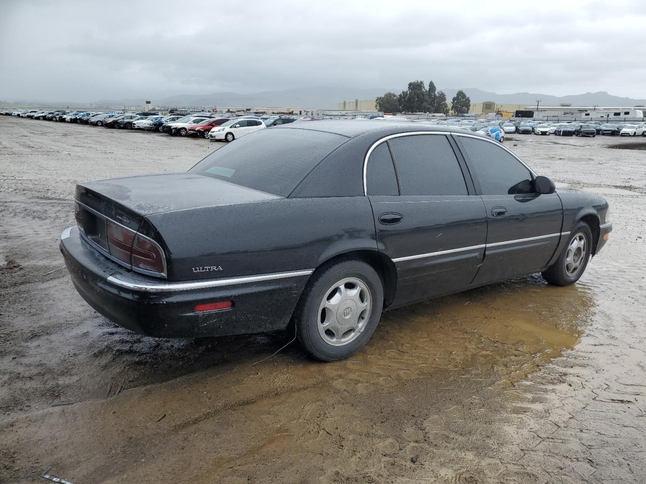 1997 Buick Park Avenue VIN 1G4CU5219V4609569 Copart auction photo, vandalism damage thumbnail 3