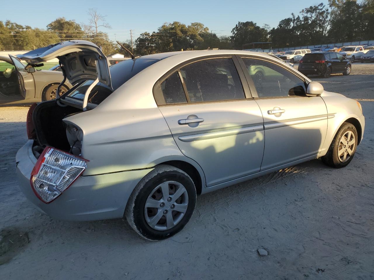 2011 Hyundai Accent VIN KMHCN4AC0BU609174 Copart auction photo, rear end / minor dent/scratches damage thumbnail 3