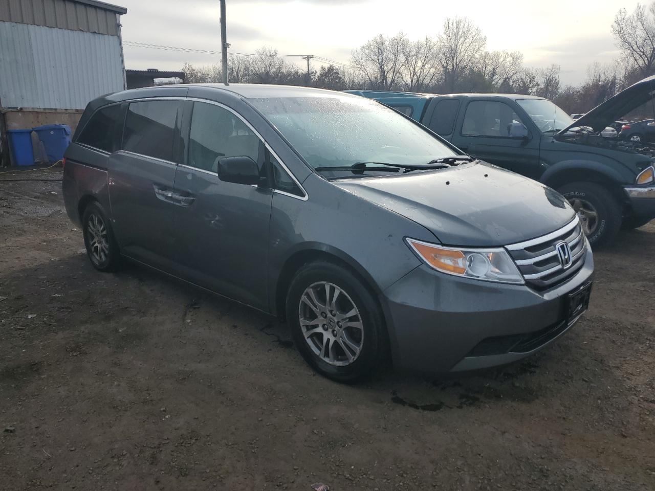 2012 Honda Odyssey VIN 5FNRL5H47CB046224 Copart auction photo, side / minor dent/scratches damage thumbnail 4