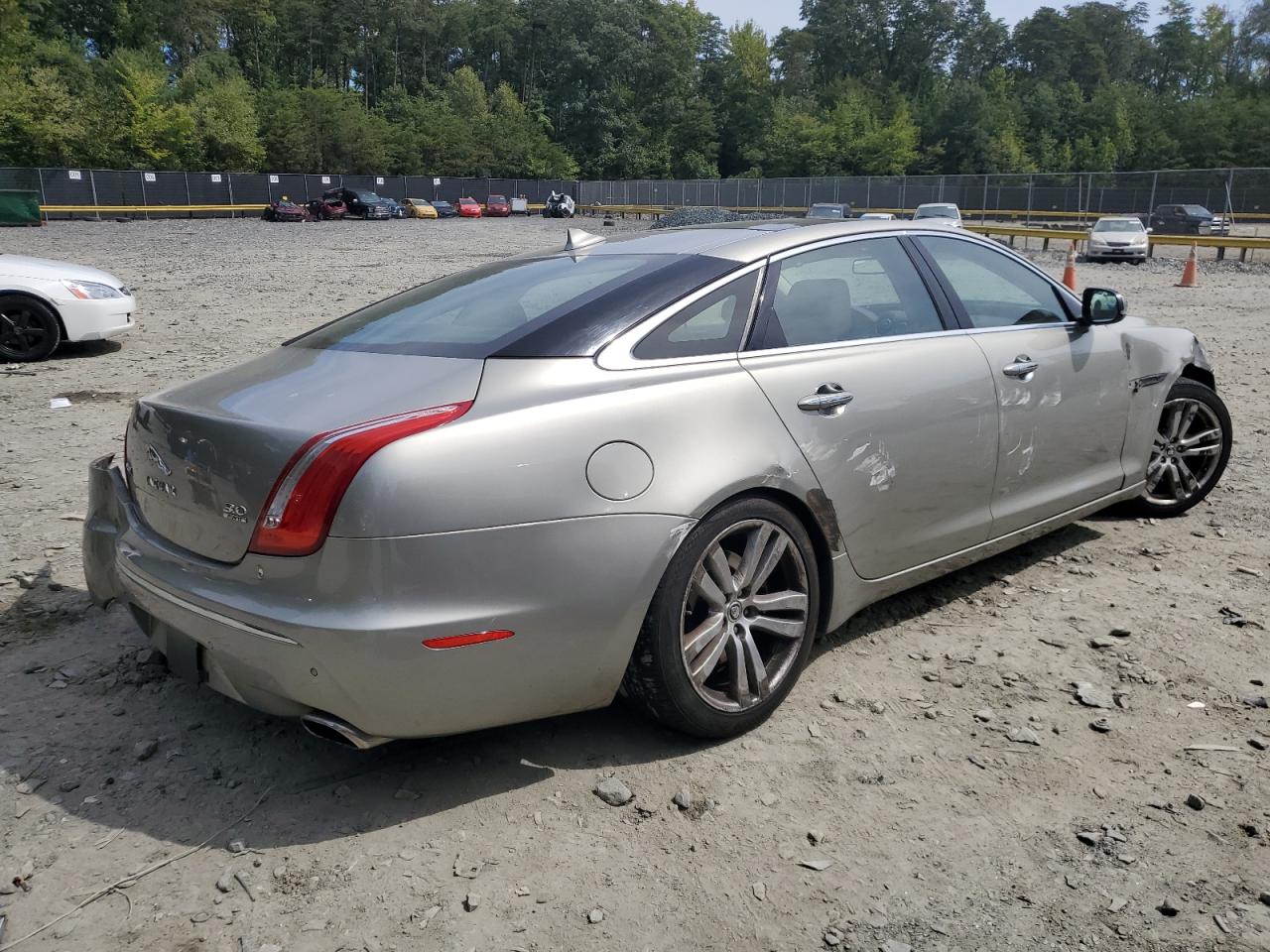 2013 Jaguar XJ VIN SAJWJ2GD5D8V44210 Copart auction photo, all over / undercarriage damage thumbnail 3