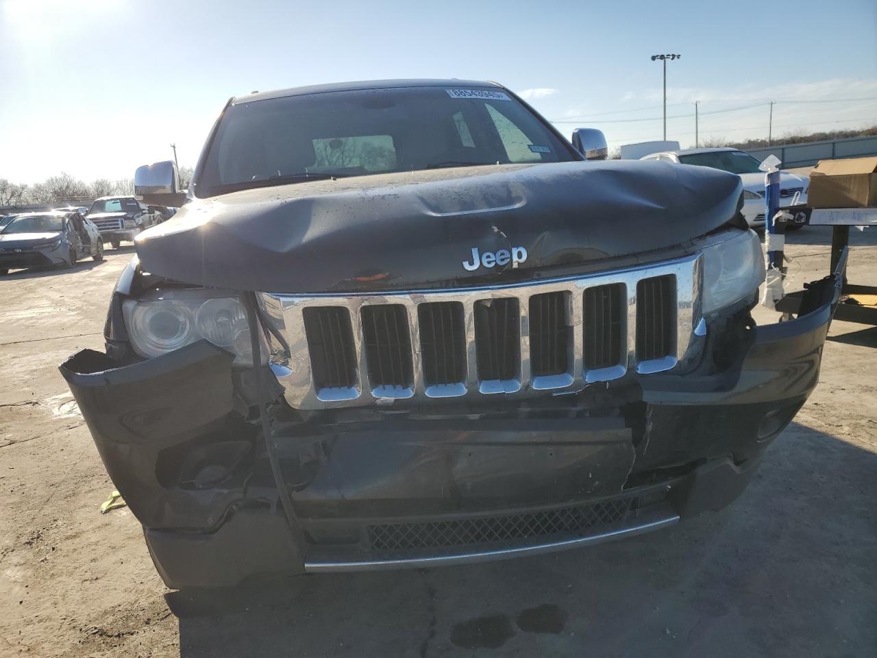 2011 Jeep Grand Cherokee VIN 1J4RR5GT0BC575608 Copart auction photo, front end / hail damage thumbnail 5