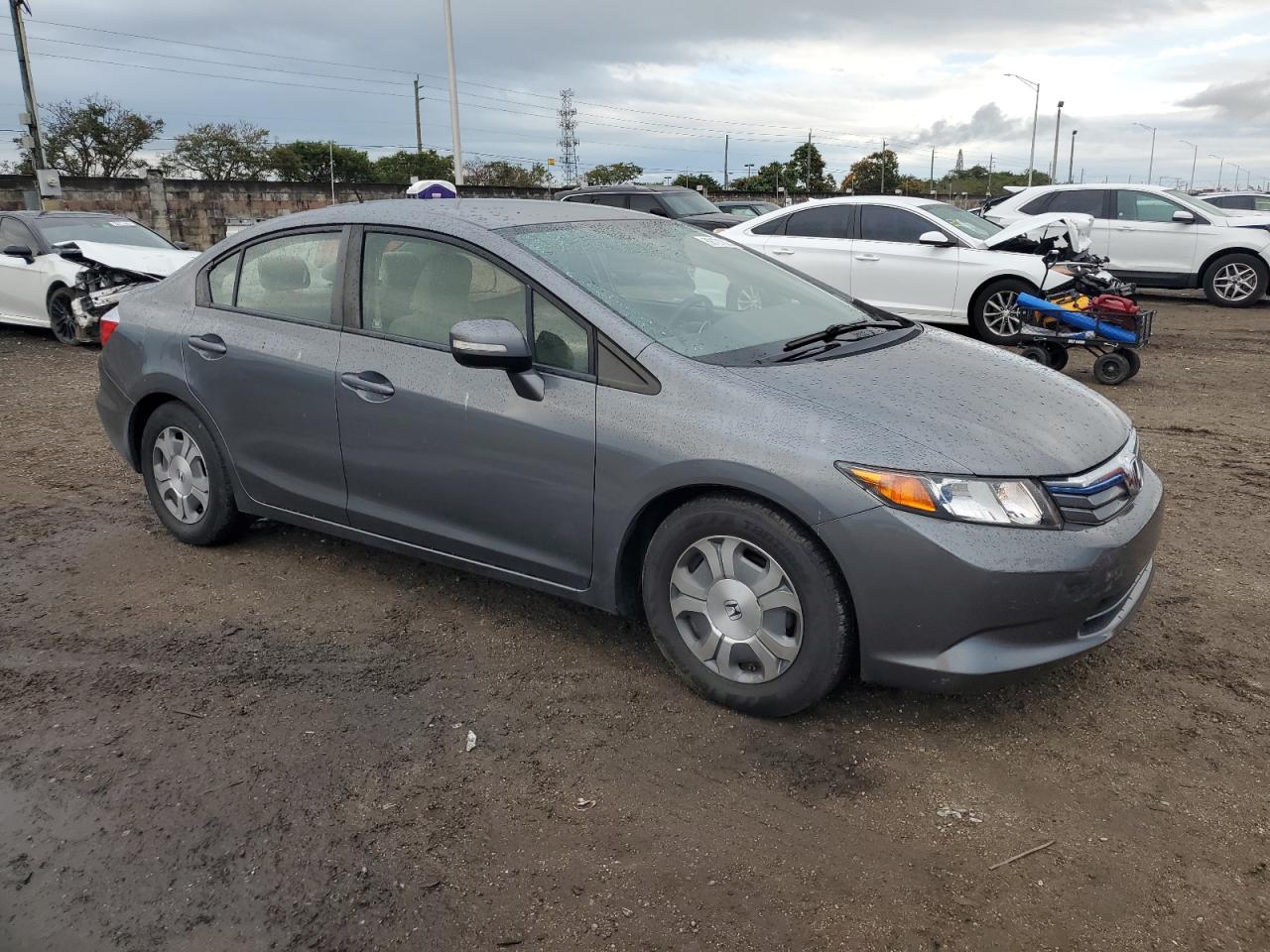2012 Honda Civic VIN JHMFB4F23CS005625 Copart auction photo, side / rear end damage thumbnail 4
