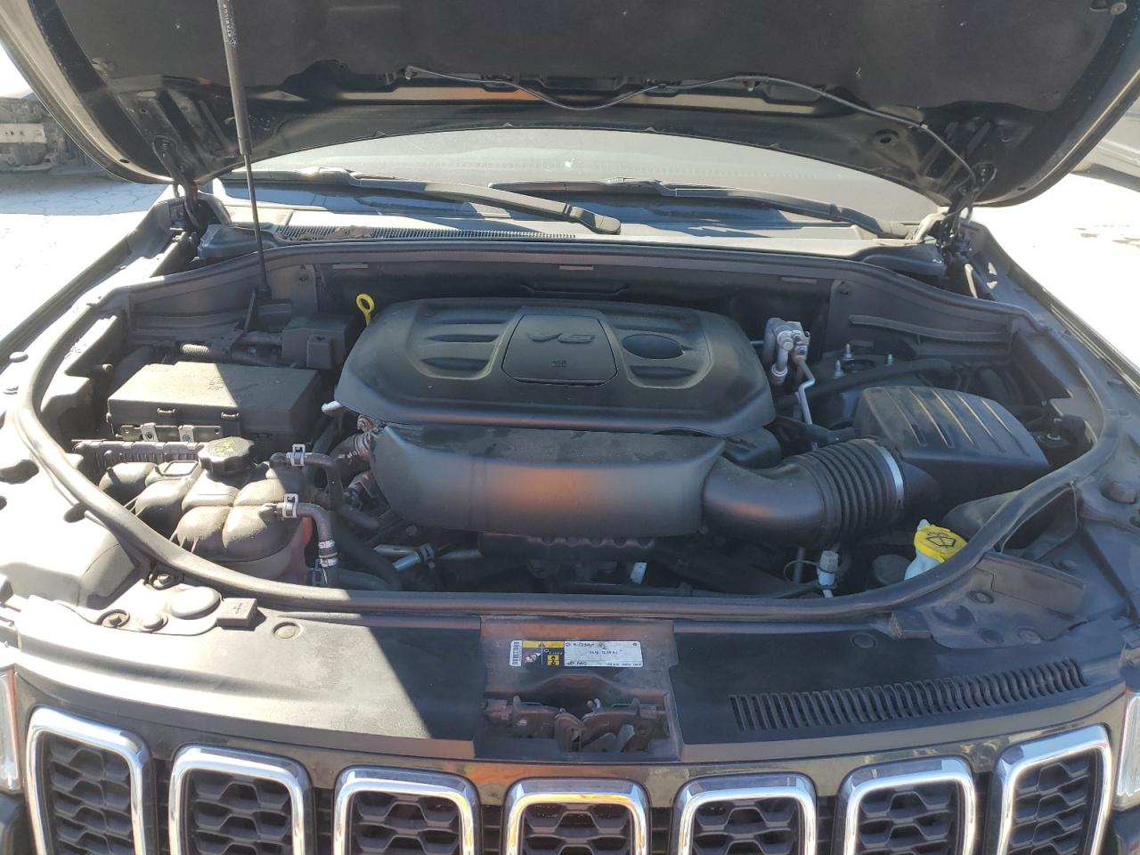 2019 Jeep Grand Cherokee VIN 1C4RJFBG1KC795742 Copart auction photo, side damage thumbnail 12
