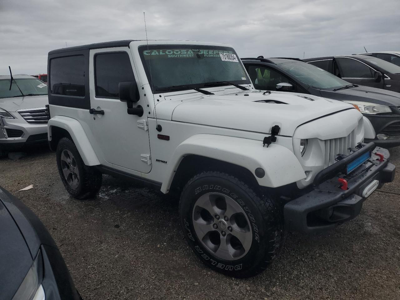 2016 Jeep Wrangler VIN 1C4AJWBG1GL160590 Copart auction photo, water/flood damage thumbnail 4