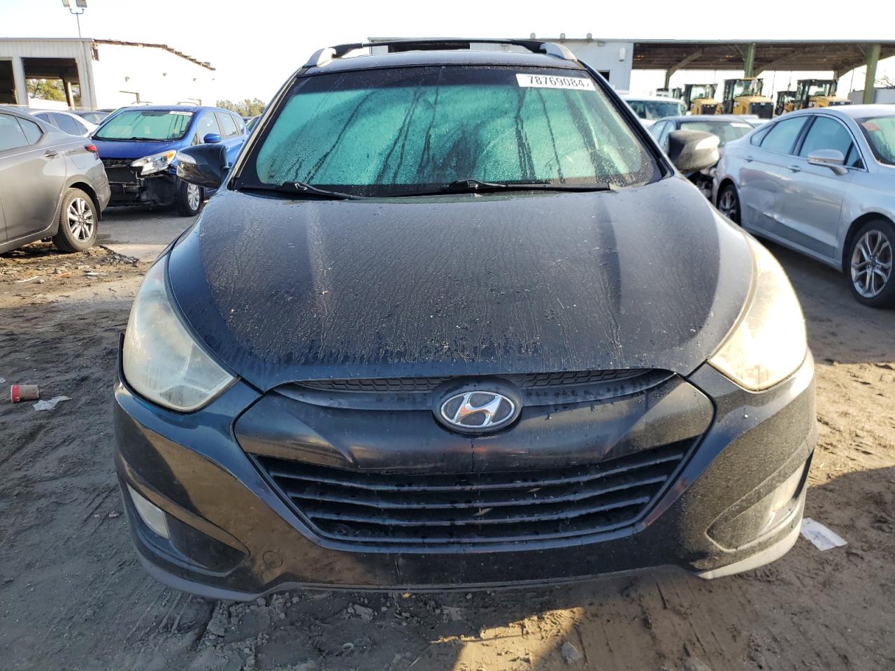 2013 Hyundai Tucson VIN KM8JU3AC0DU766954 Copart auction photo, side / front end damage thumbnail 5