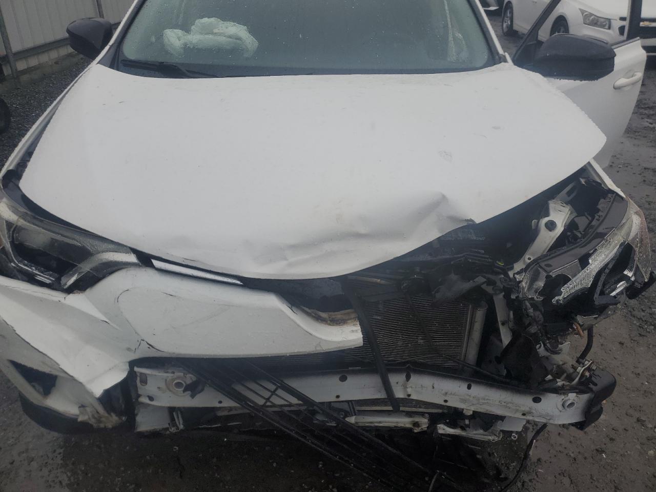 2017 Toyota RAV 4 VIN JTMBFREV4HJ161652 Copart auction photo, front end / minor dent/scratches damage thumbnail 11
