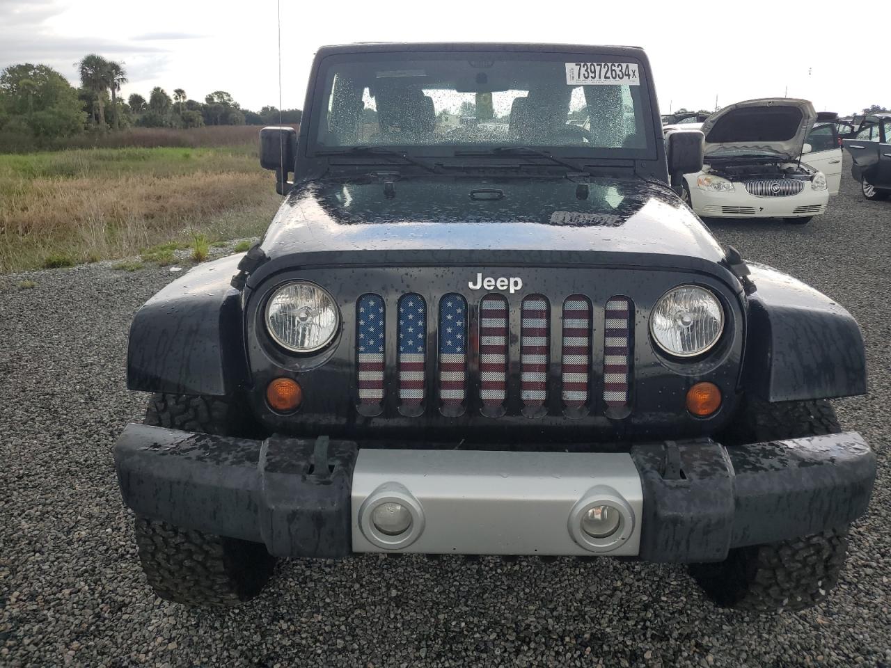 2011 Jeep Wrangler VIN 1J4BA5H14BL608843 Copart auction photo, water/flood damage thumbnail 5