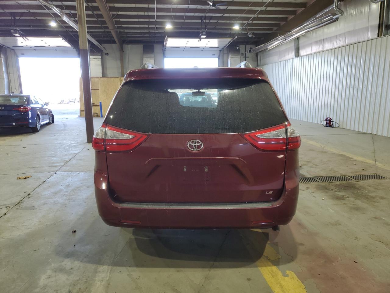 2015 Toyota Sienna VIN 5TDKK3DCXFS582462 Copart auction photo, front end / minor dent/scratches damage thumbnail 6