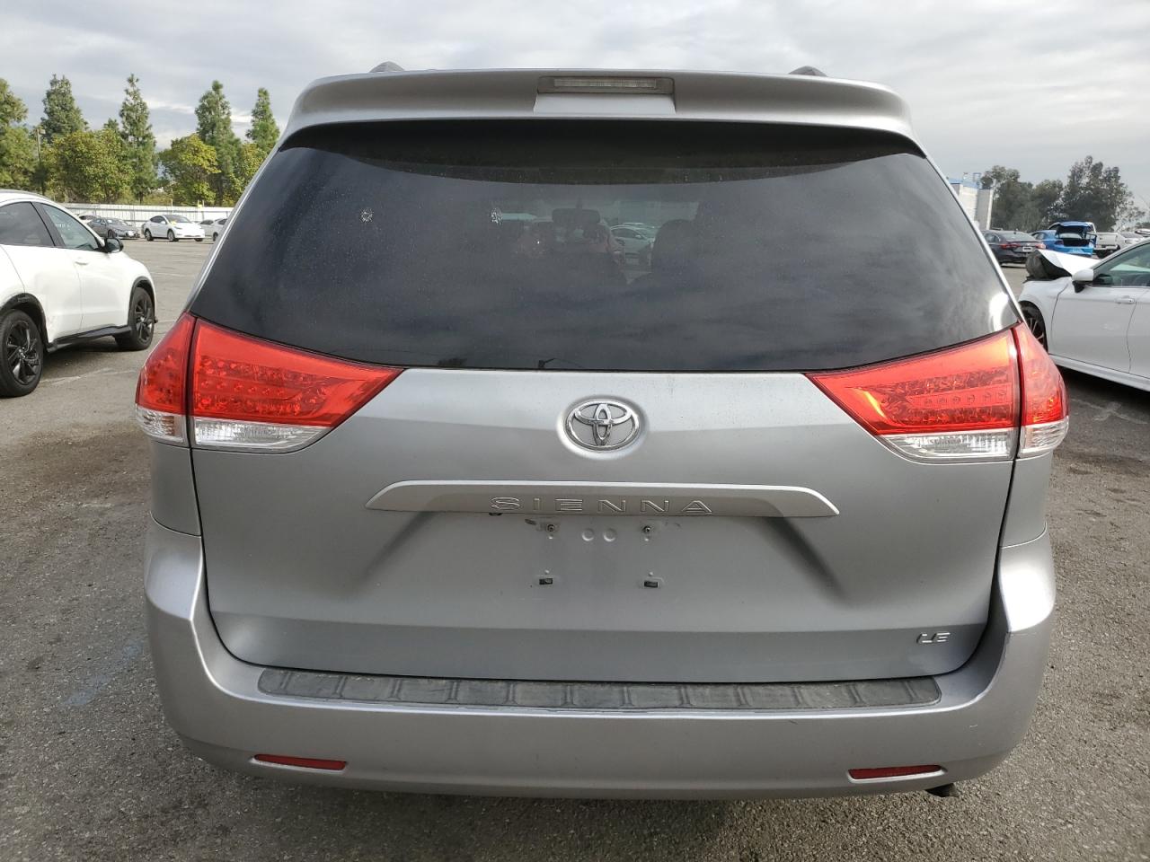 2011 Toyota Sienna VIN 5TDKK3DC9BS108254 Copart auction photo, side damage thumbnail 6
