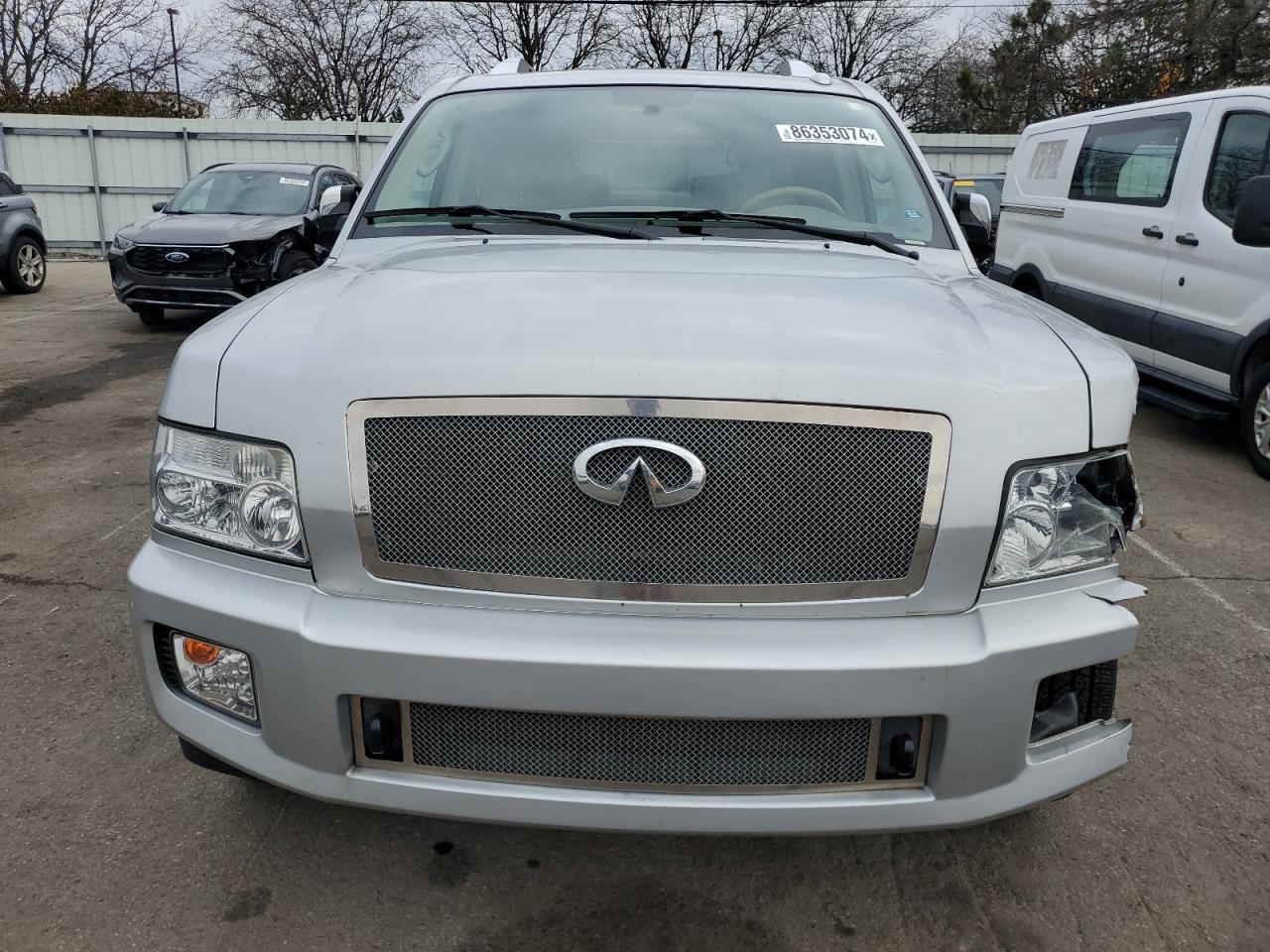 2010 Infiniti QX56 VIN 5N3ZA0NE5AN901929 Copart auction photo, all over damage thumbnail 5