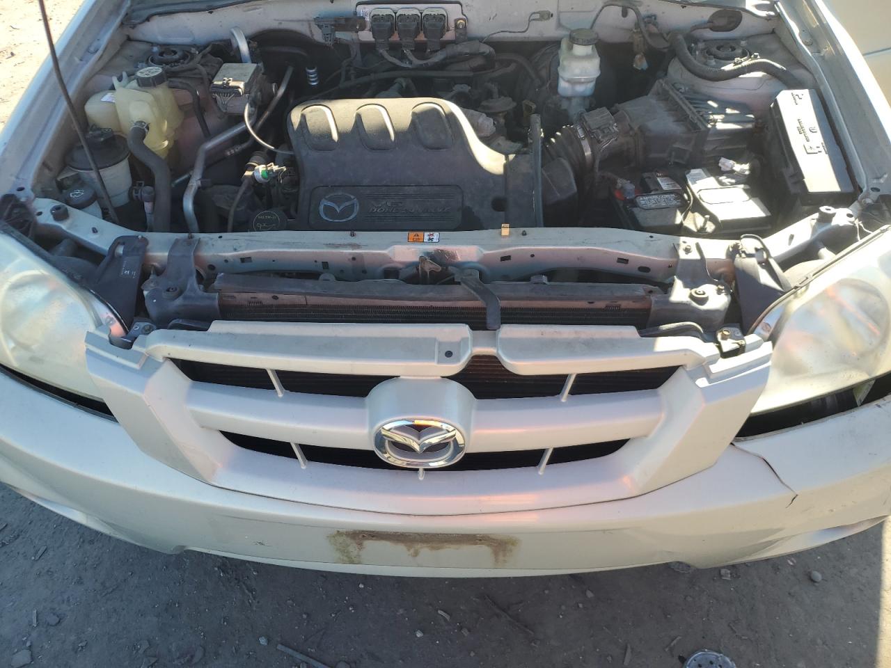 2005 Mazda Tribute VIN 4F2YZ94115KM52180 Copart auction photo, front end / minor dent/scratches damage thumbnail 12