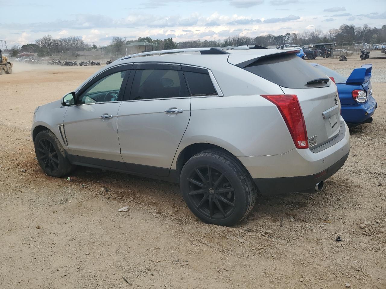 2015 Cadillac SRX VIN 3GYFNBE33FS535376 Copart auction photo, minor dent/scratches damage thumbnail 2