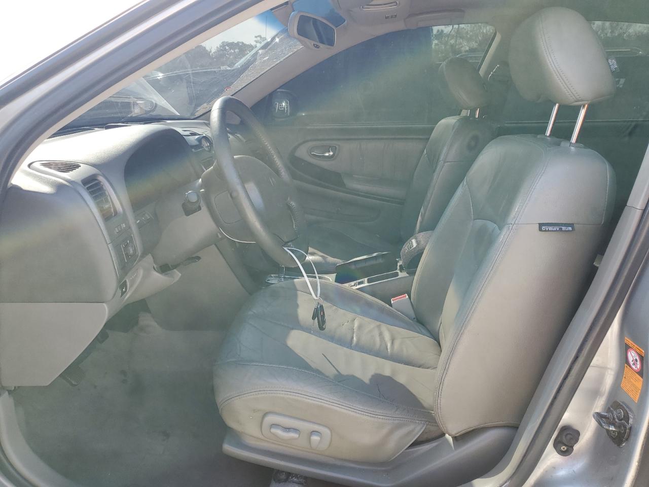 2000 Infiniti I VIN JNKCA31A0YT123308 Copart auction photo, rear end / minor dent/scratches damage thumbnail 7
