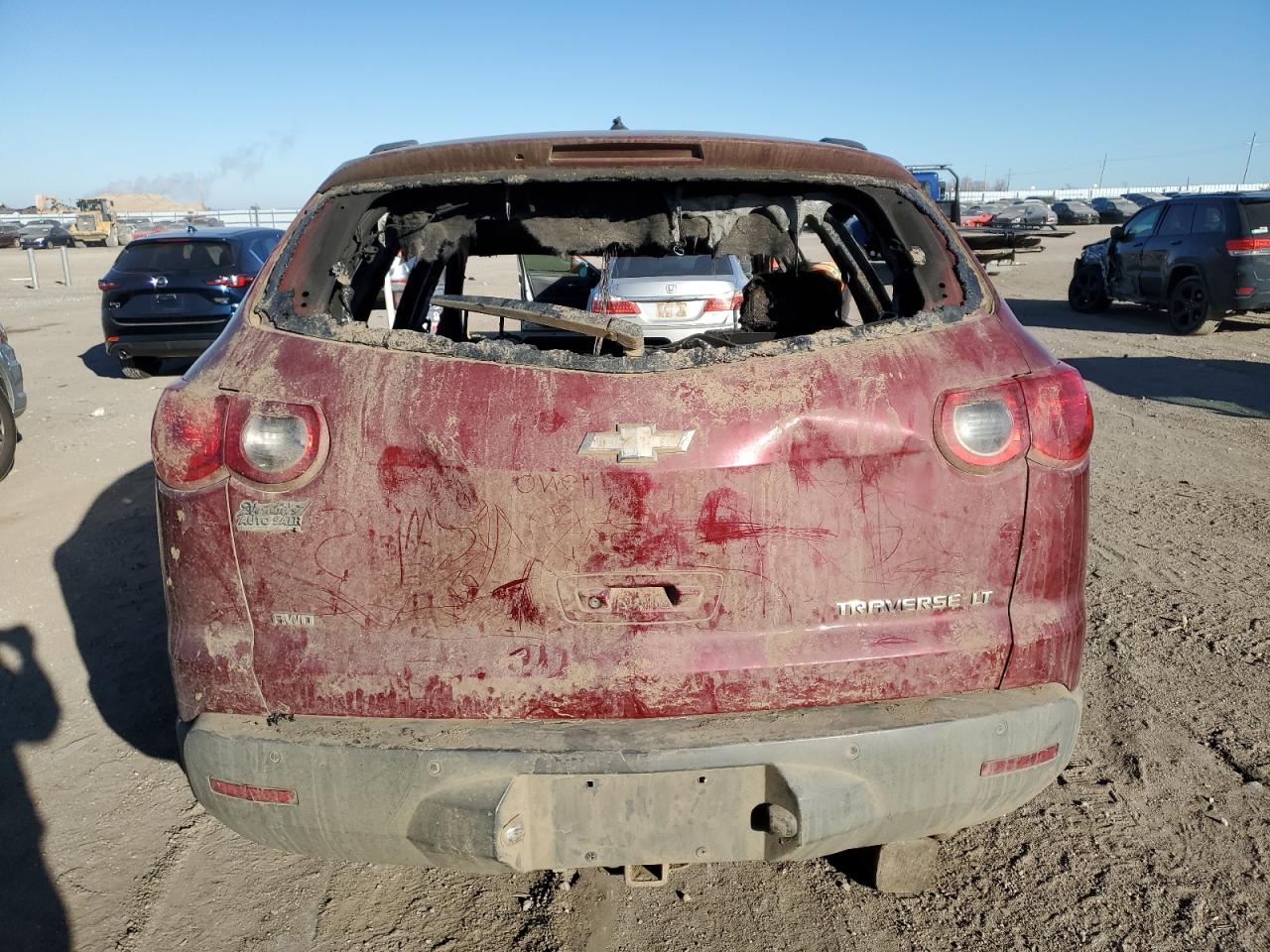 2010 Chevrolet Traverse VIN 1GNLVFED6AS147322 Copart auction photo, burn / hail damage thumbnail 6