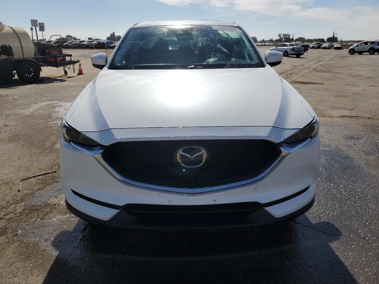 2020 Mazda CX-5 VIN JM3KFADM4L0854656 Copart auction photo, vandalism damage thumbnail 5