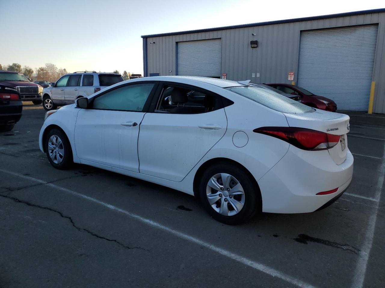 2016 Hyundai Elantra VIN 5NPDH4AE7GH666989 Copart auction photo, all over damage thumbnail 2