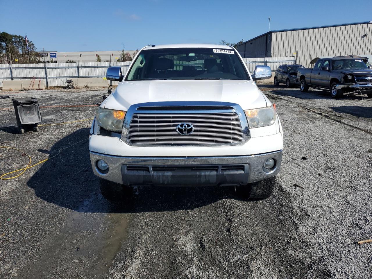 2011 Toyota Tundra VIN 5TFDW5F16BX194900 Copart auction photo, side damage thumbnail 5