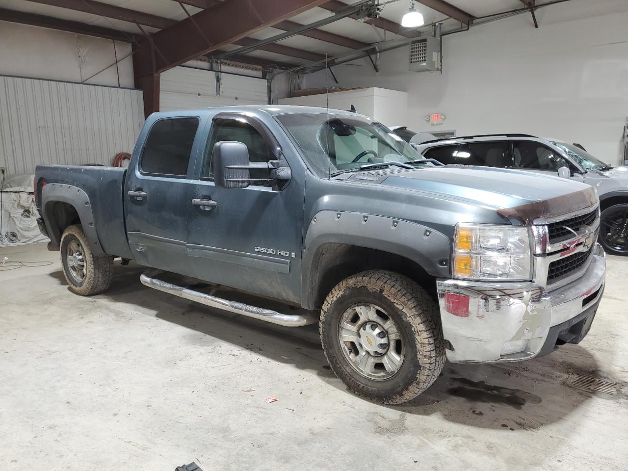 2009 Chevrolet Silverado VIN 1GCHK53619F188550 Copart auction photo, side damage thumbnail 4