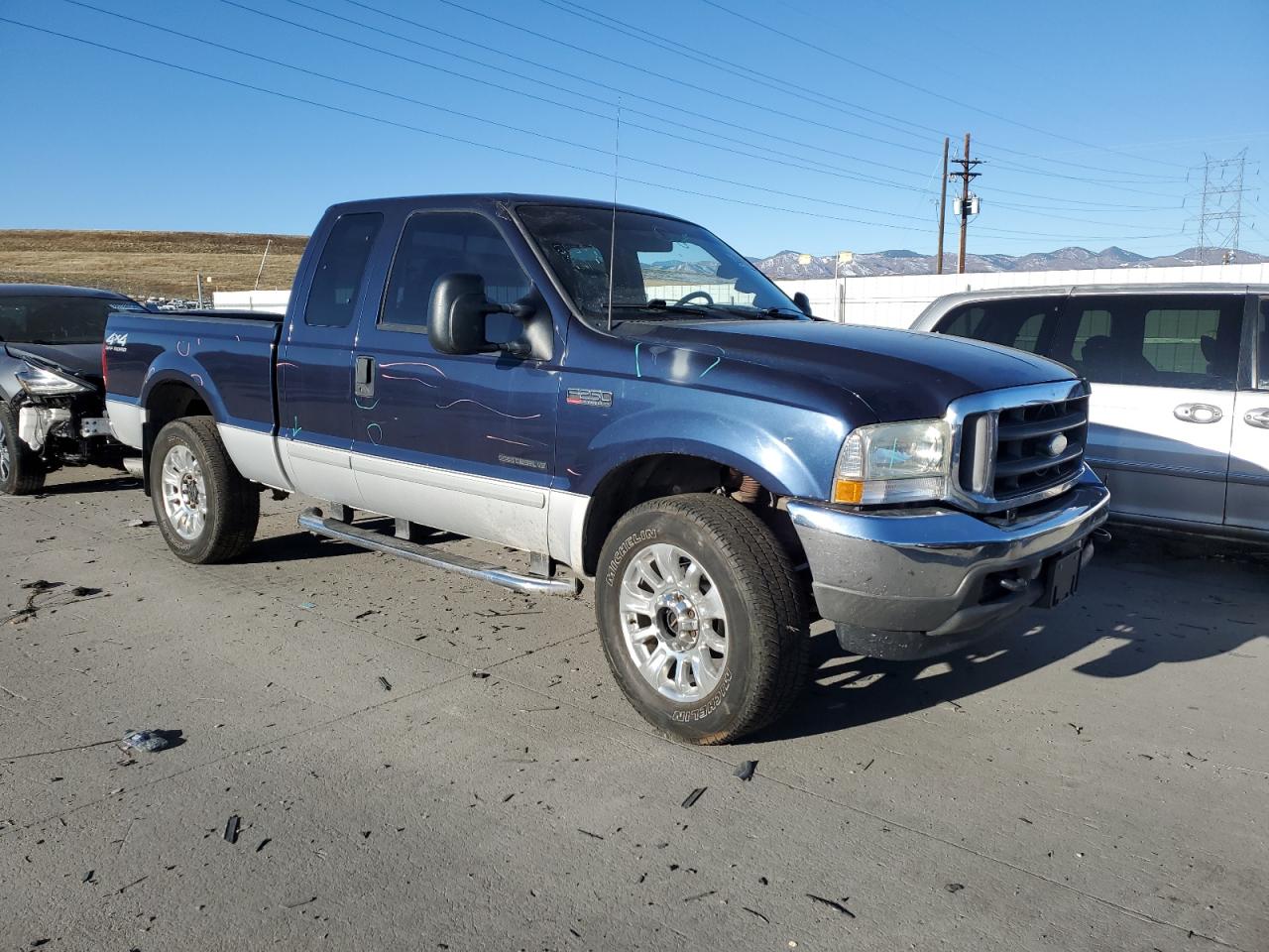 2002 Ford F250 VIN 1FTNX21FX2EC71198 Copart auction photo, all over damage thumbnail 4