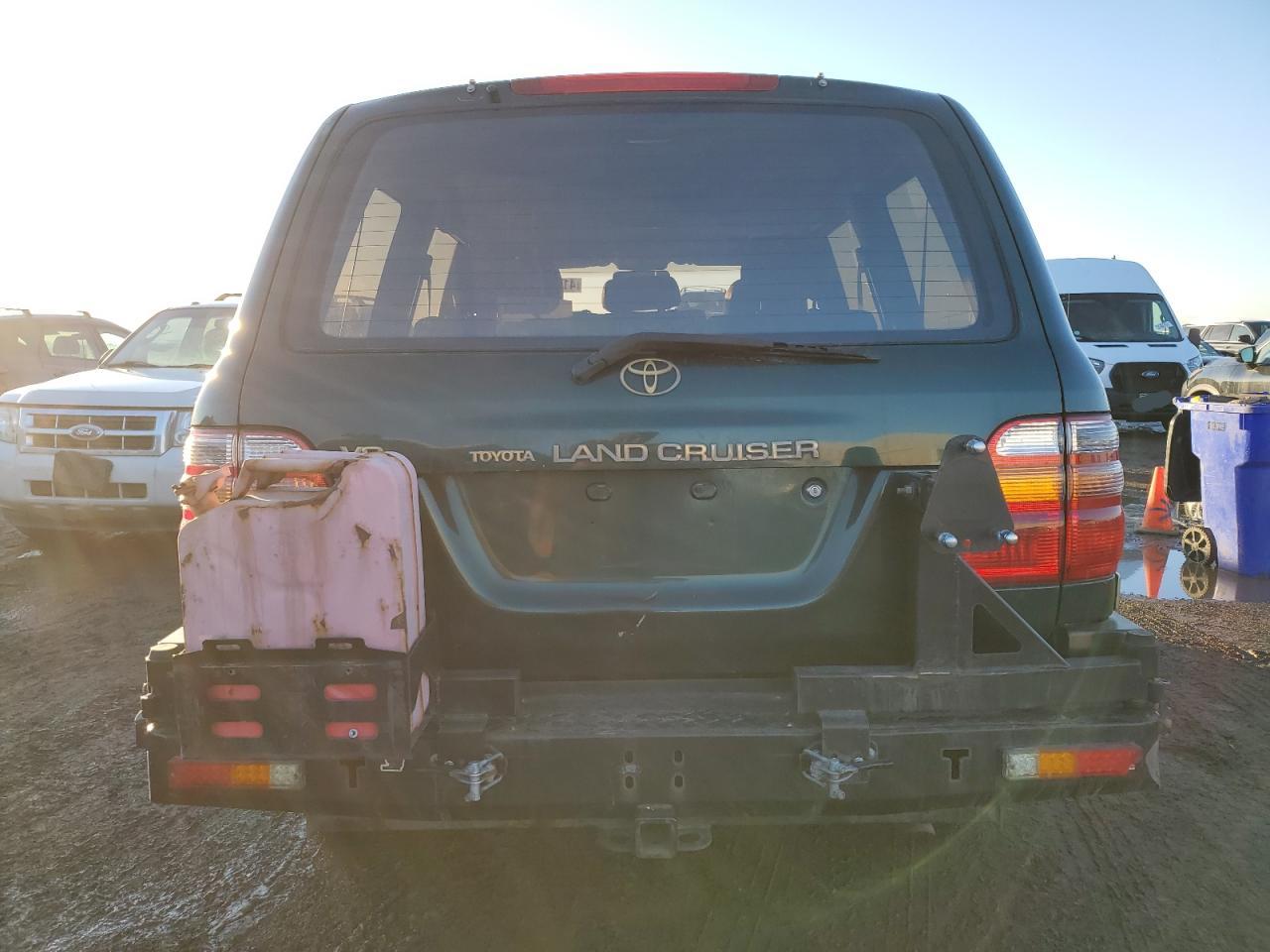 1998 Toyota Land Cruiser VIN JT3HT05J0W0015414 Copart auction photo, side / front end damage thumbnail 6