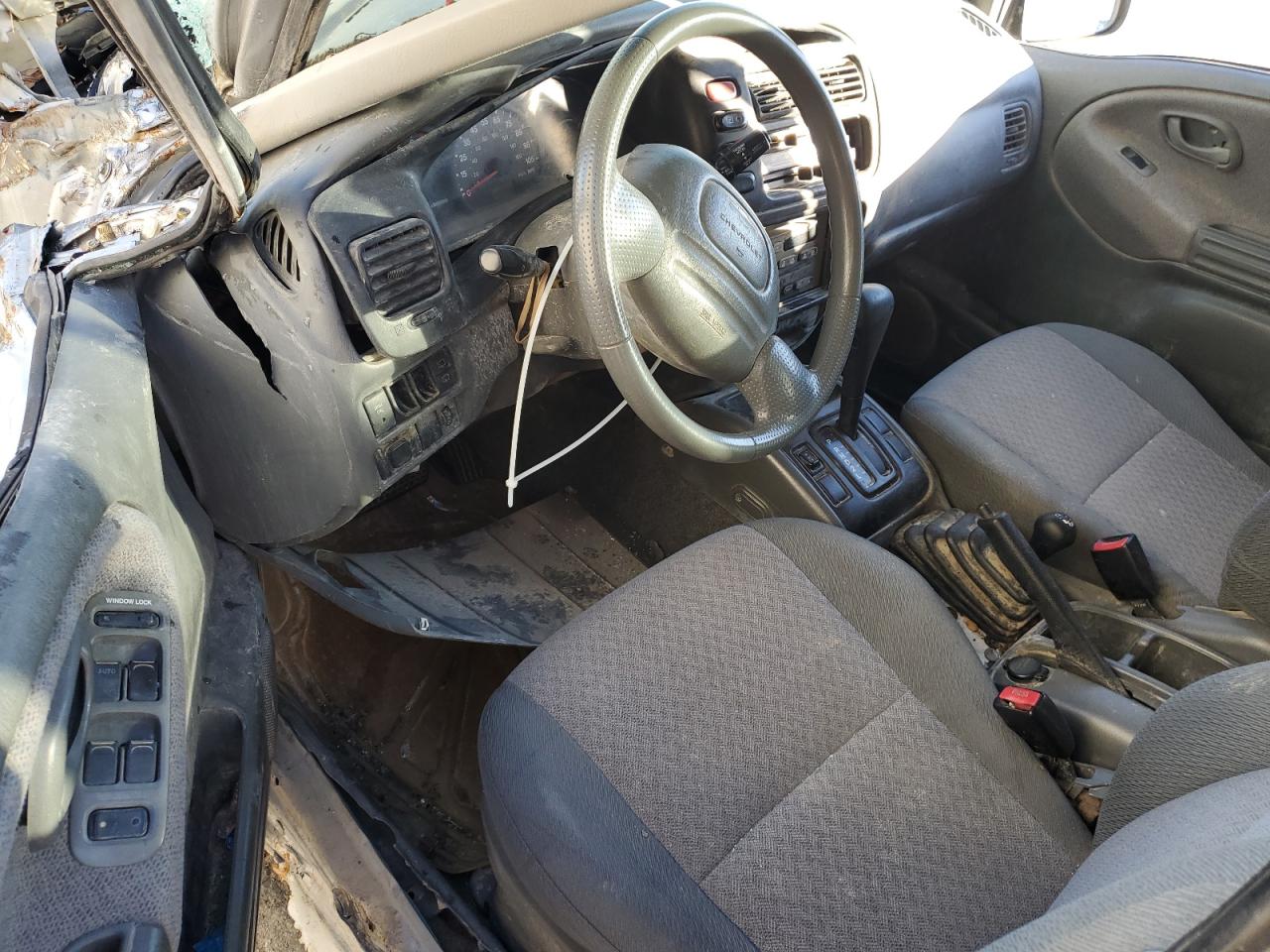 2001 Chevrolet Tracker VIN 2CNBJ13C016955242 Copart auction photo, all over damage thumbnail 8