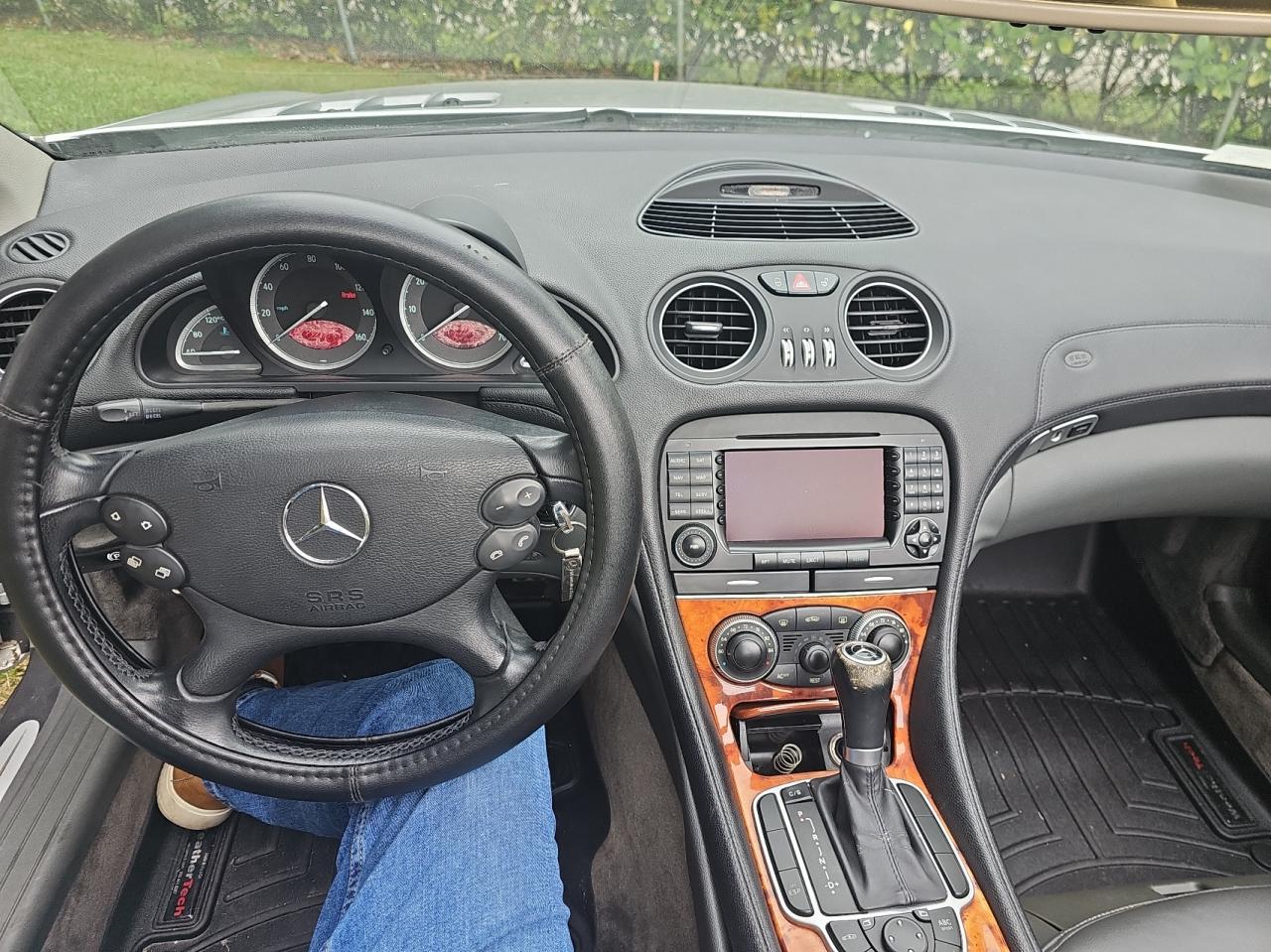 2005 Mercedes-Benz SL-klasse VIN WDBSK75F05F104970 Copart auction photo, minor dent/scratches / normal wear damage thumbnail 9