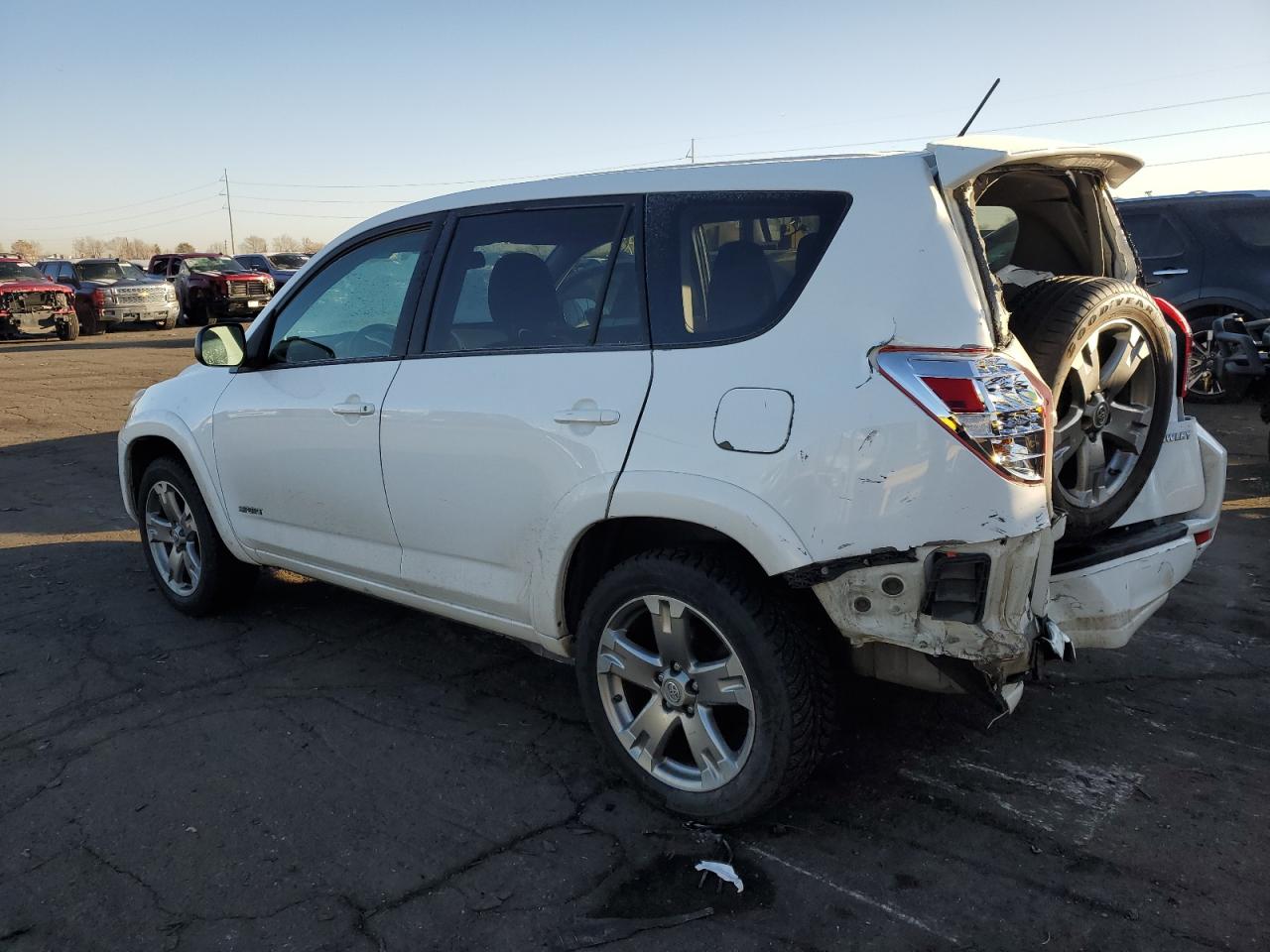 2012 Toyota RAV 4 VIN 2T3WF4DV3CW140078 Copart auction photo, rear end / hail damage thumbnail 2