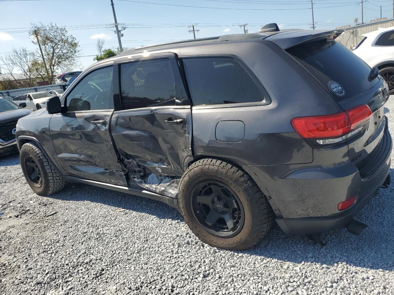 2018 Jeep Grand Cherokee VIN 1C4RJFBT2JC444477 Copart auction photo, side damage thumbnail 2