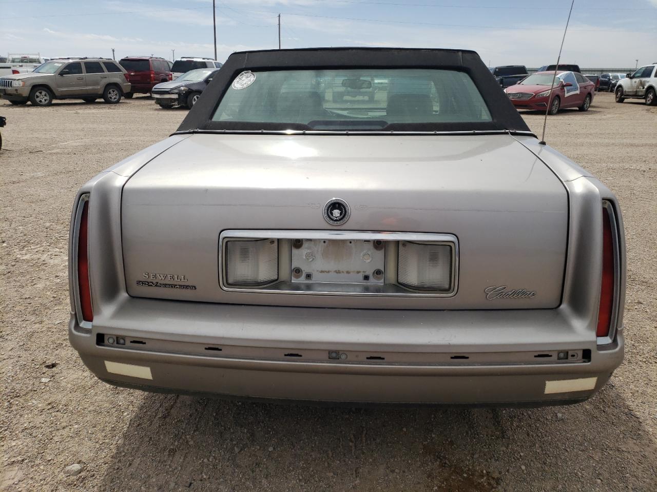 1998 Cadillac De Ville VIN 1G6KD54Y2WU797558 Copart auction photo, side / front end damage thumbnail 6