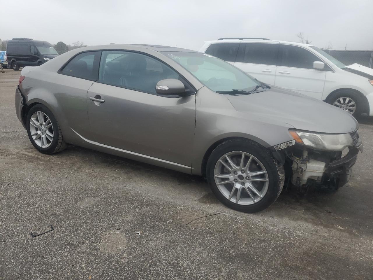 2010 KIA Forte VIN KNAFW6A34A5307709 Copart auction photo, all over damage thumbnail 4